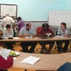 Slide 1: Senate committee hearing in the Kimberley, Western Australia. People are sitting at a table, listening to a witness talking.